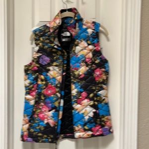 North Face open vest. Size s multi colored
